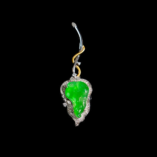 Green jade-like leaf brooch in silver setting, with small yellow gold accent.