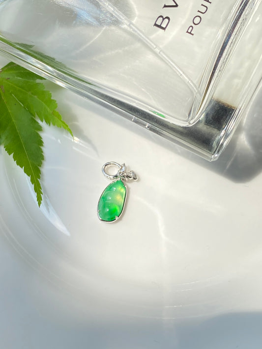 Green jadeite bean pendant with silver loop bail and small hoop clasp