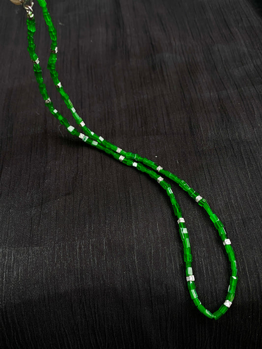 Vibrant green jadeite beaded necklace with silver spacers and free-form oval links