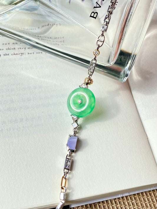 Jadeite donut charm bracelet with green round pendant and silver link segments