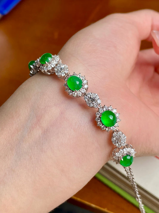 Green jadeite cabochon bracelet with silver-toned pavé links and chain