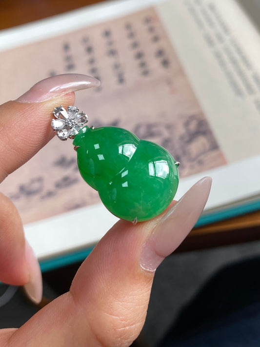 Green gourd jade pendant with raised bezel and two-stone crystal accent