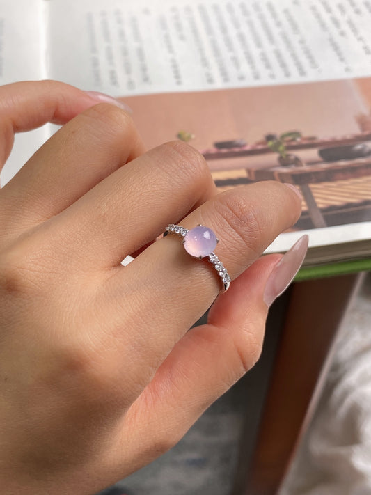 Lavender jadeite cabochon ring with pavé band on hand