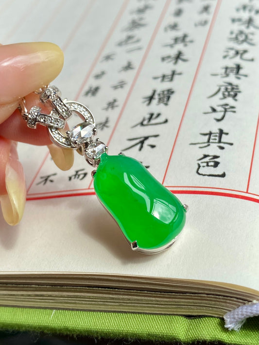 Green jadeite melon pendant necklace with silver-toned rhinestone link chain