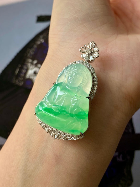Green jade Guanyin heart pendant with silver border, flower bail, and carved face