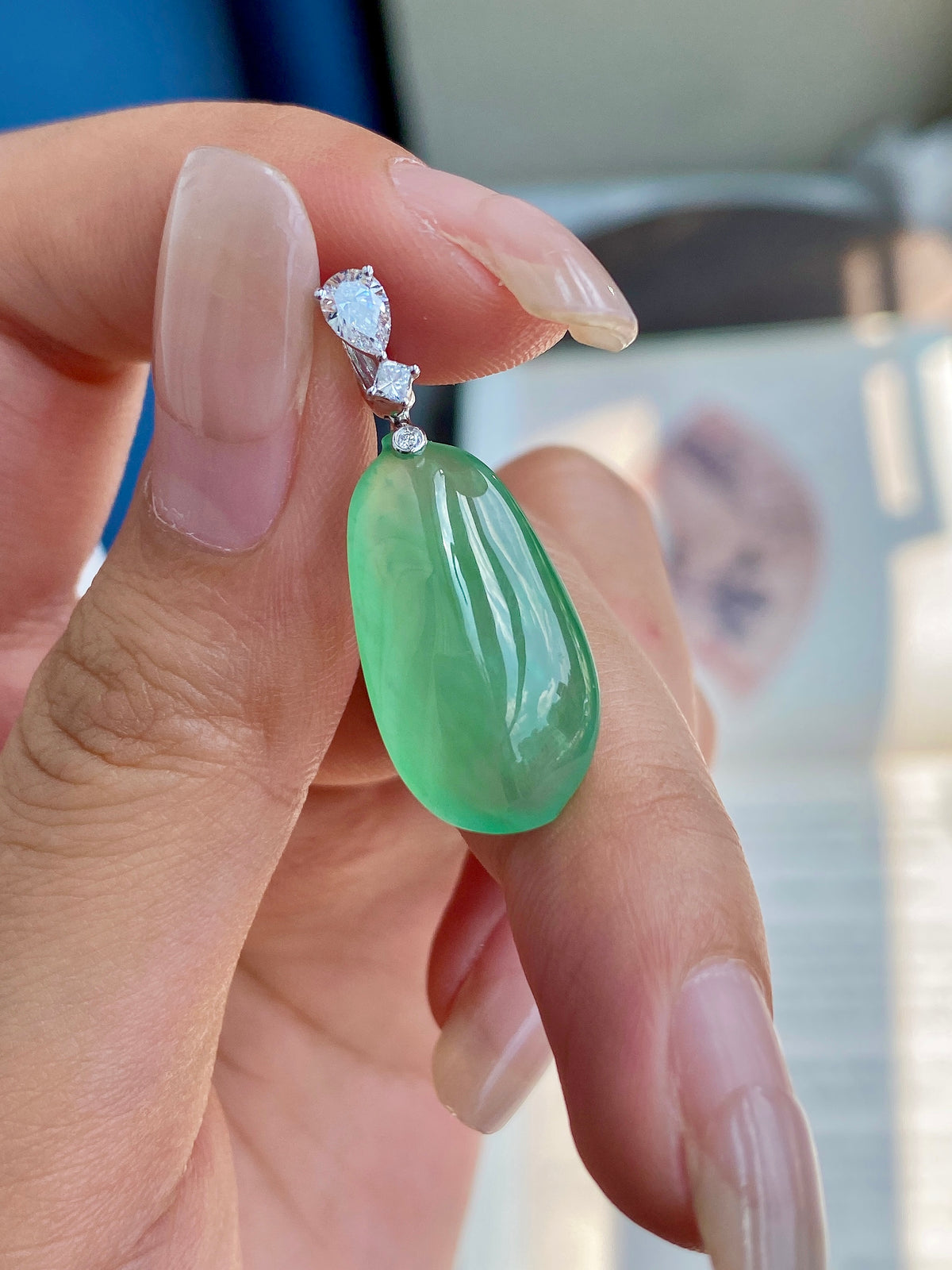 Green jadeite melon pendant with diamond-accent bail