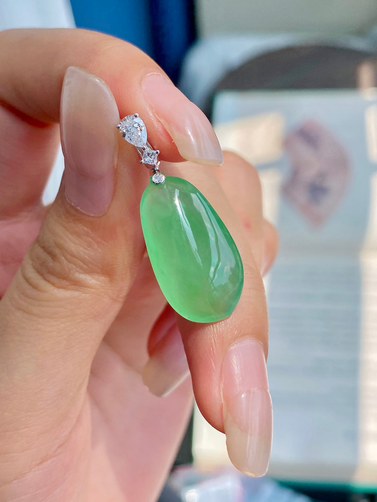 Green jadeite melon pendant with diamond-like cluster and silver-toned bail
