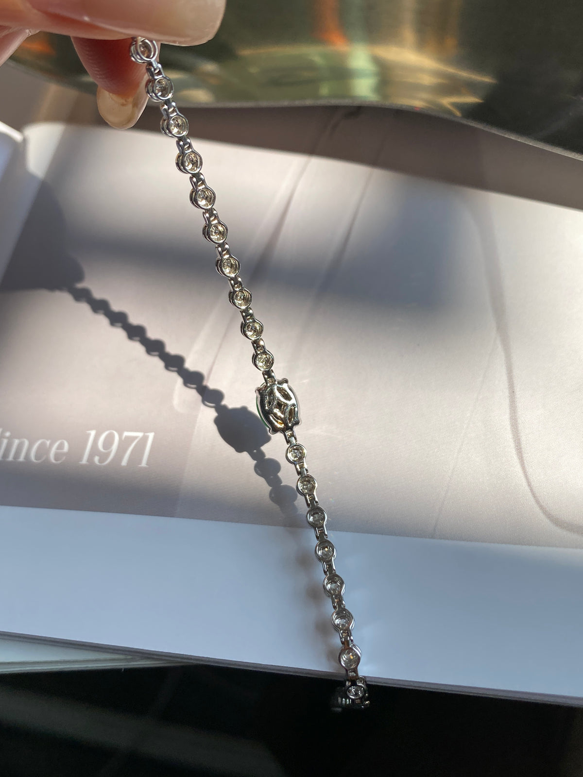 Silver-tone beaded bracelet with sparkling link chain and small round accents