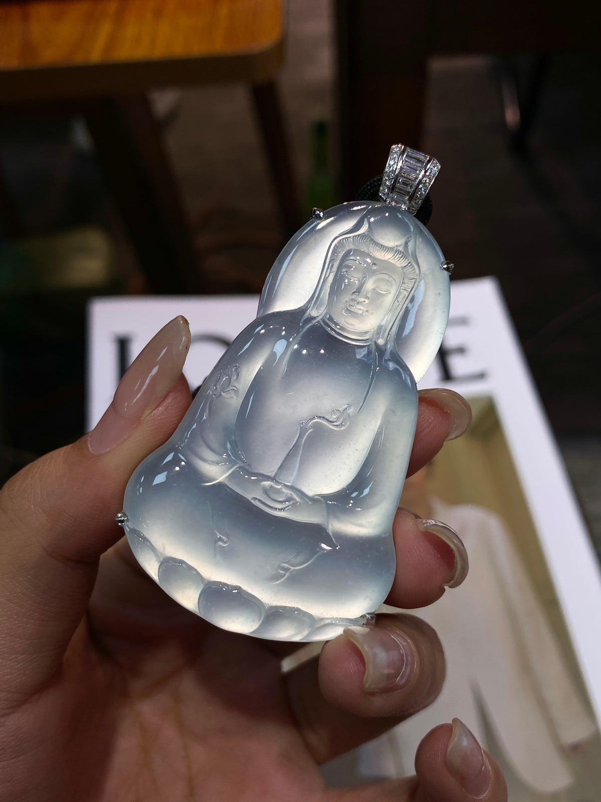 Front view translucent light blue-white Guanyin pendant with jeweled bail