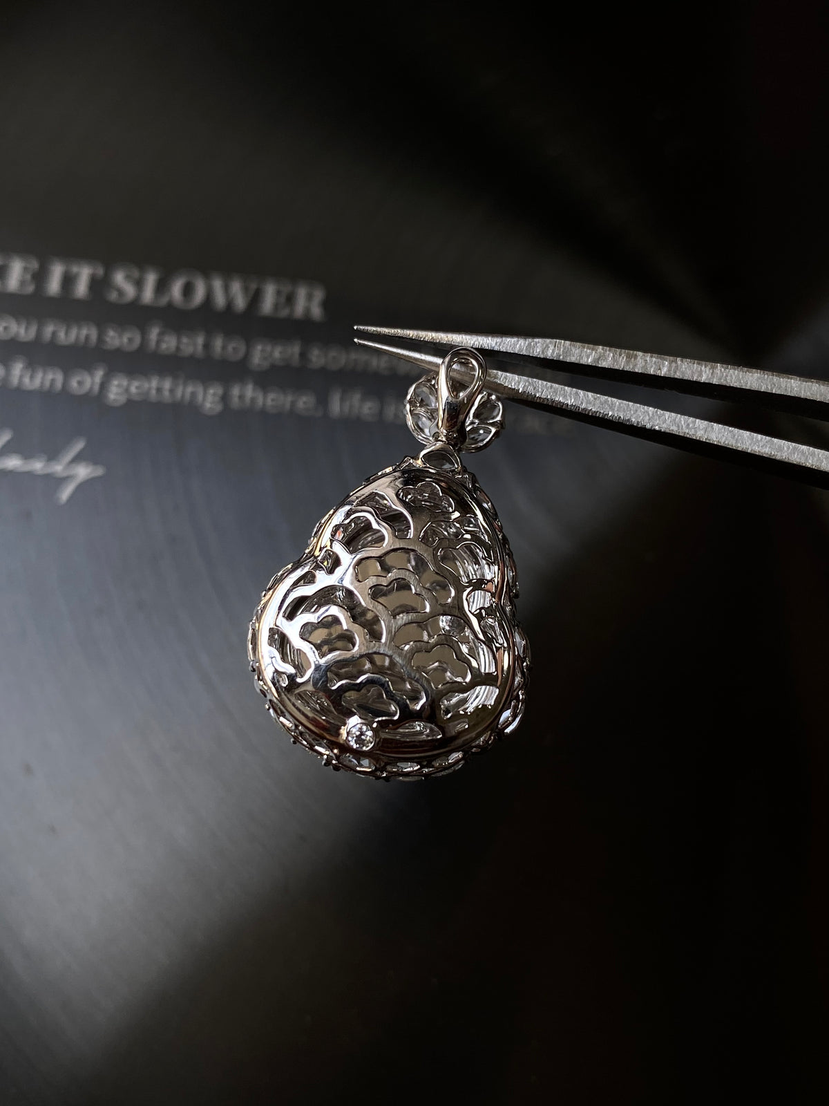 Ornate silver-tone teardrop pendant bail and back with openwork leaf pattern
