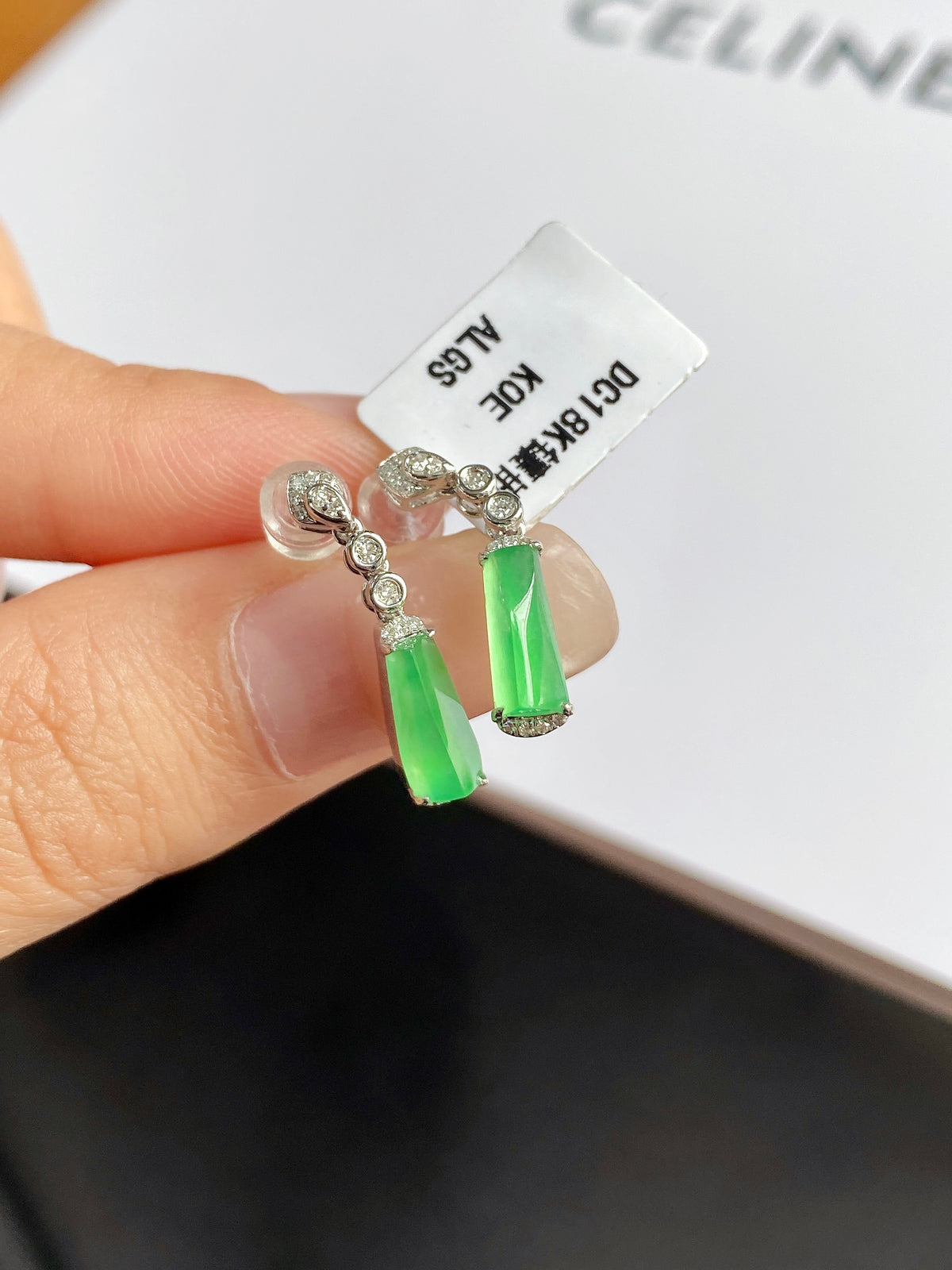 Green jadeite drop earrings with bezel-set stones and small metal beads
