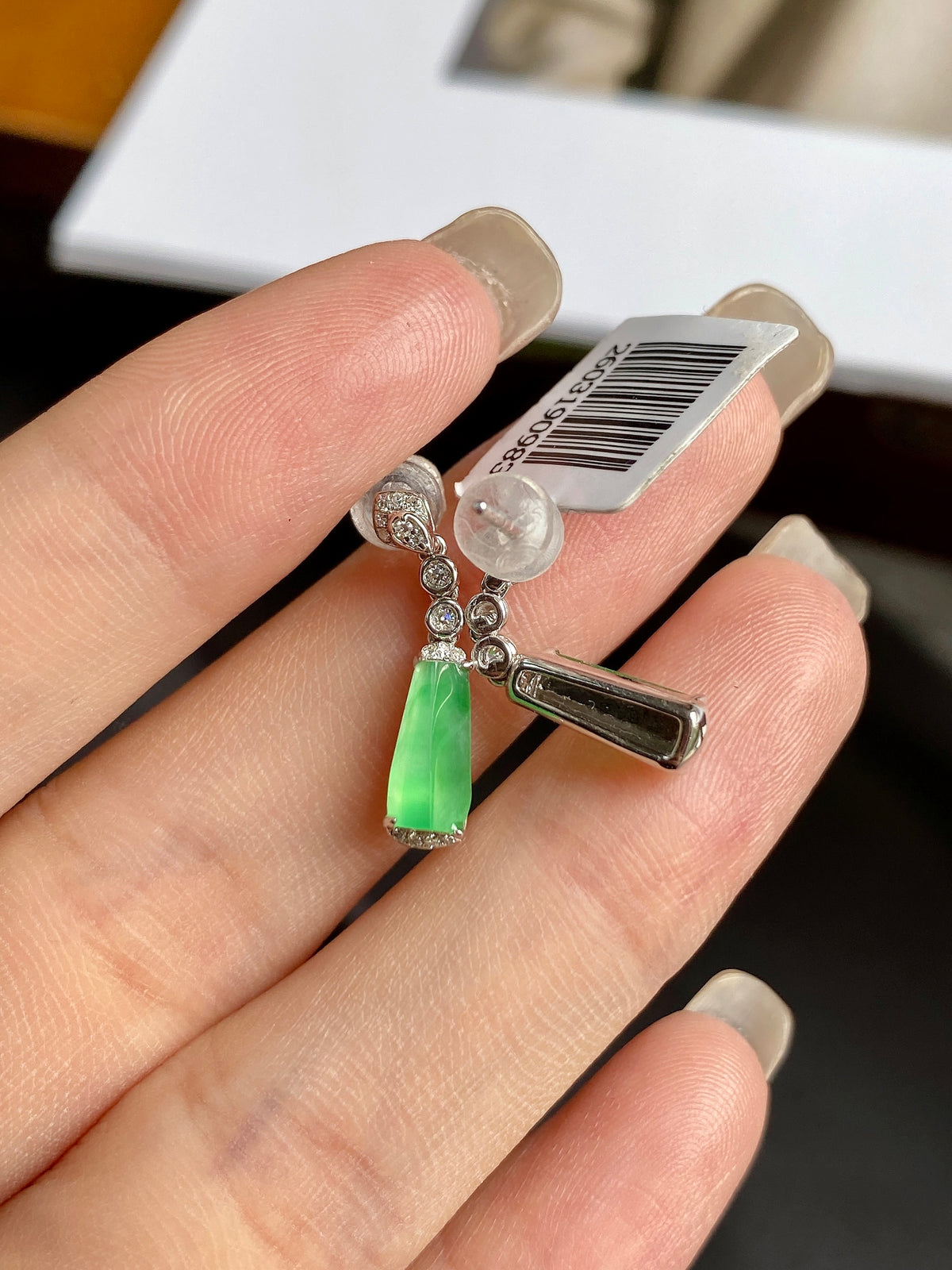 Green jadeite drop earrings with silver bead and round stone details