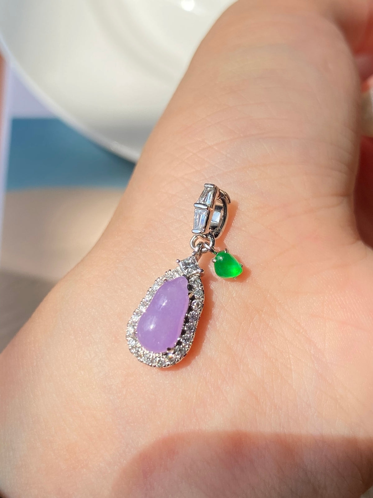Silver-tone lavender jade bean pendant with green teardrop accent and hoop bail