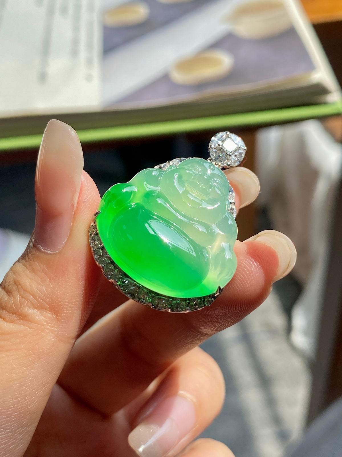 Green jadeite Buddha pendant with diamond-accent bail