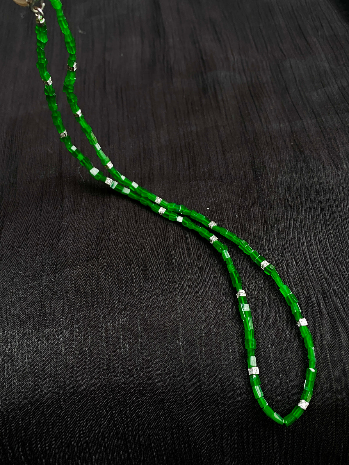 Vibrant green jadeite beaded necklace with silver spacers and free-form oval links