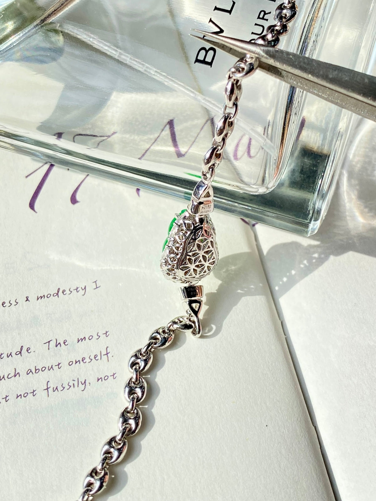 Silver chain bracelet with green jade gourd charm and decorative dangling links