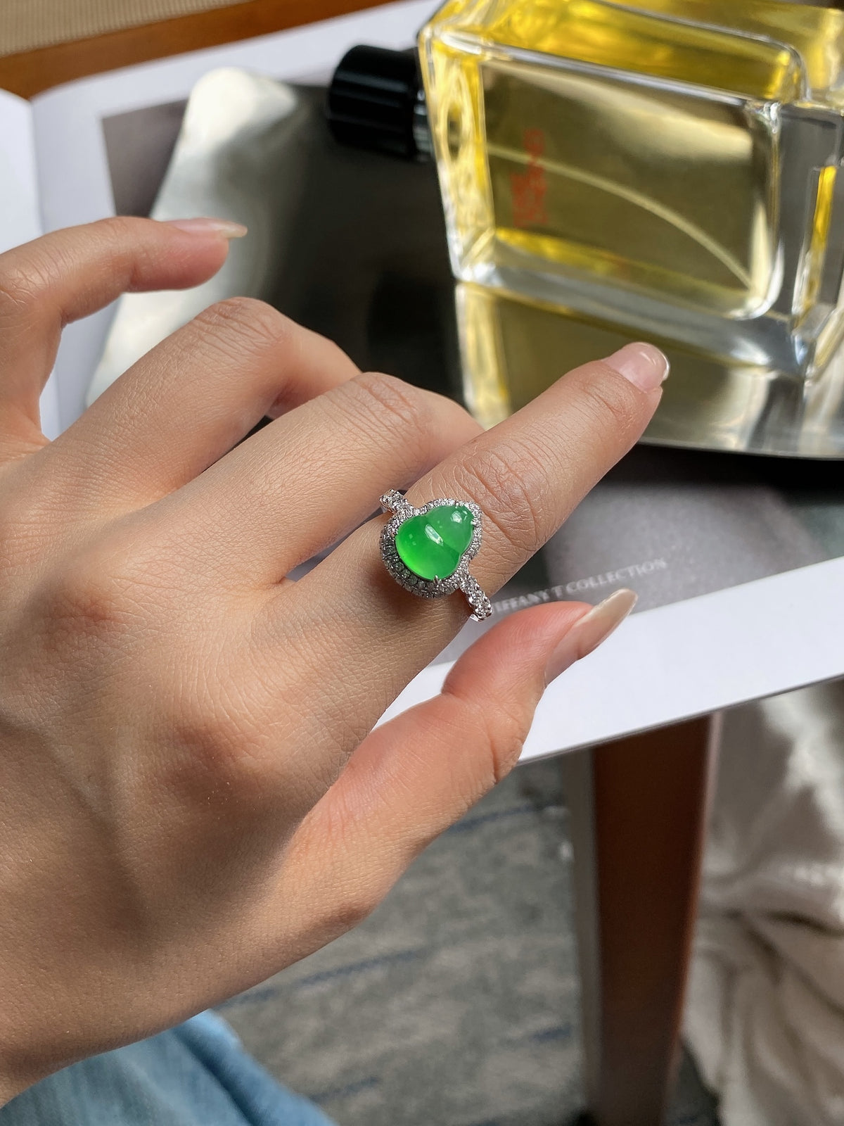 Green jadeite gourd ring with round diamond halo and textured silver band