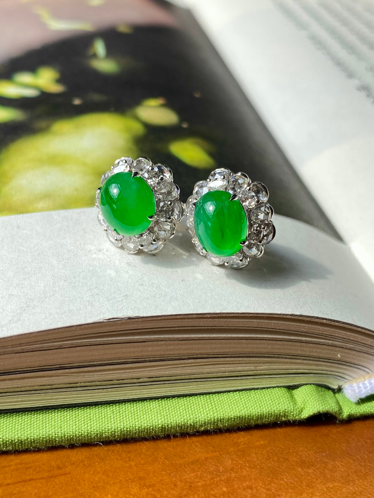Green jade cabochon stud earrings, silver filigree halos with crystal accents