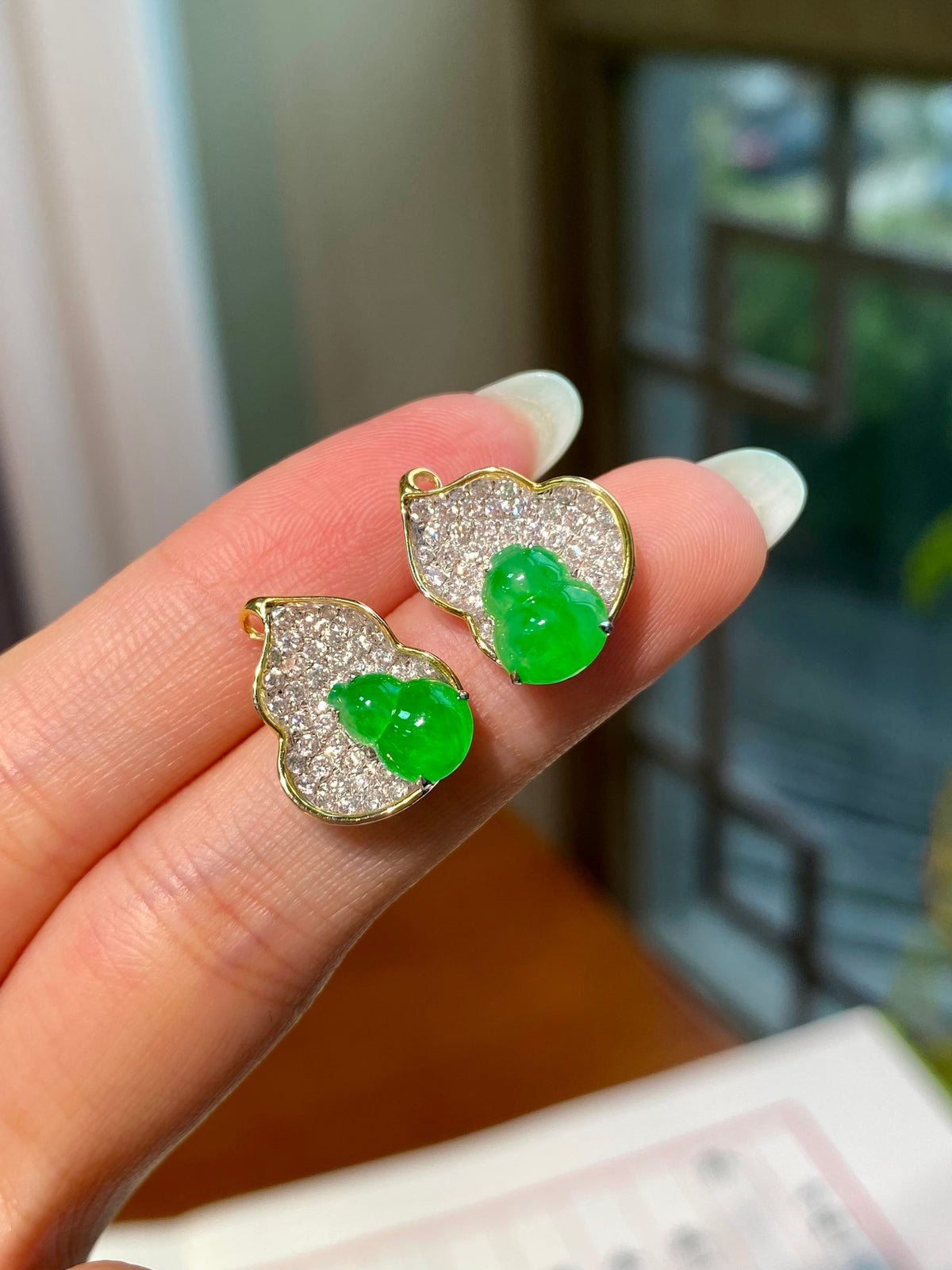 Jadeite gourd stud earrings with green stones and pavé crystal halos