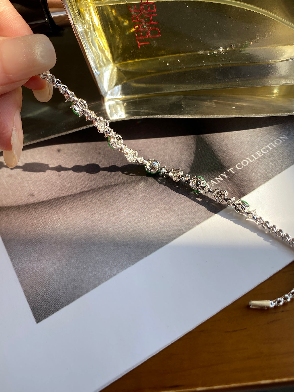 Silver chain bracelet with green jadeite cabochon accents