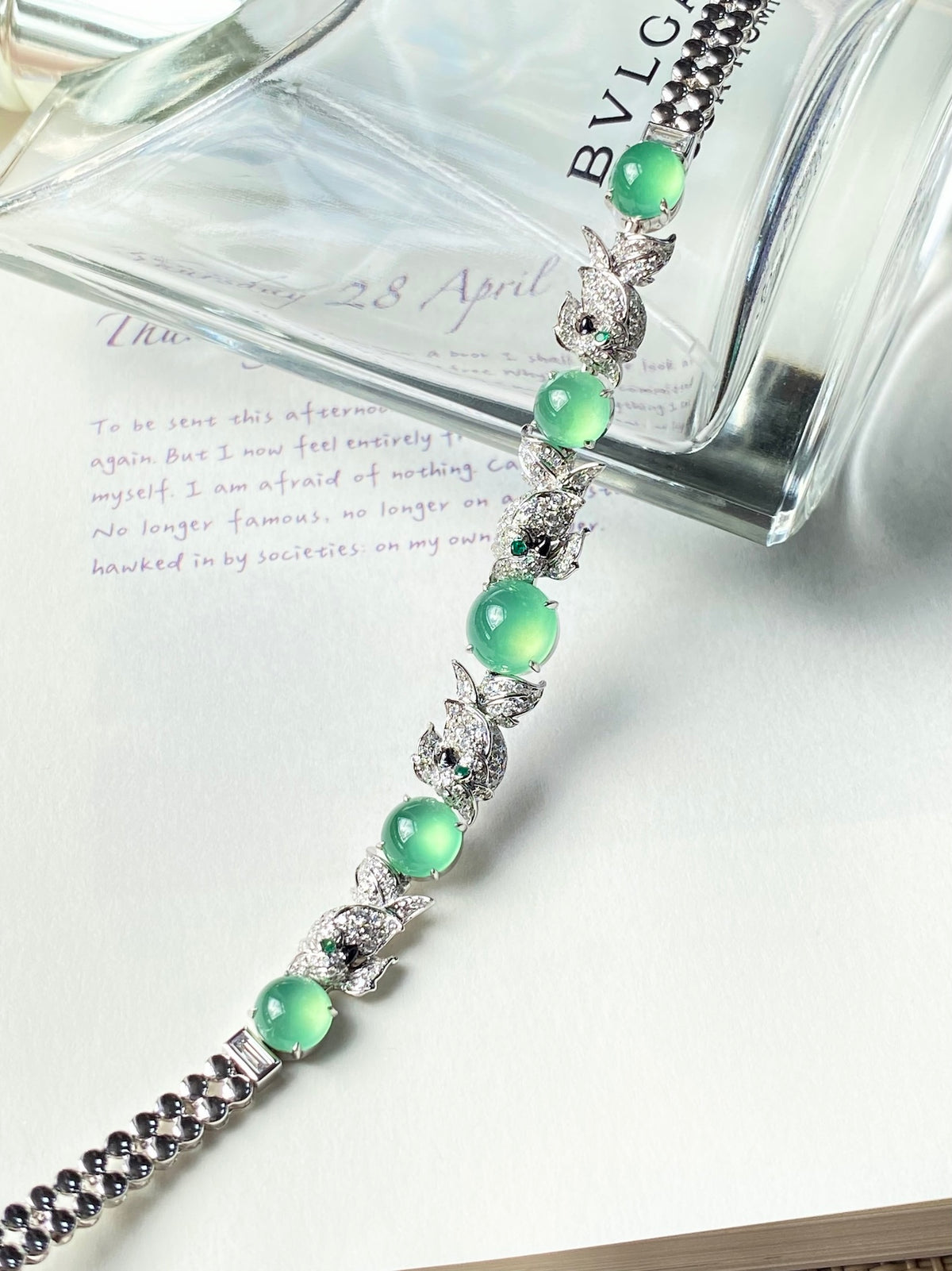 Jadeite cabochon bracelet with green stones and silver floral links