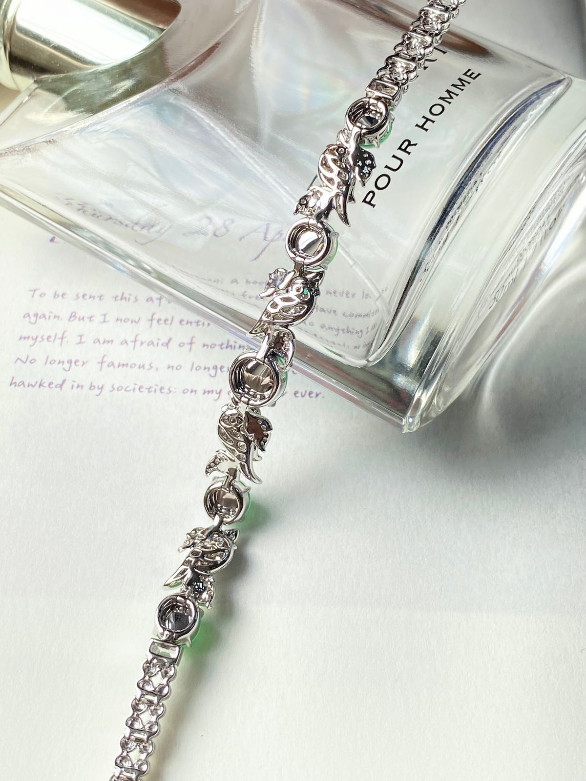 Green jadeite cabochon bracelet with diamond-style links and round clasp