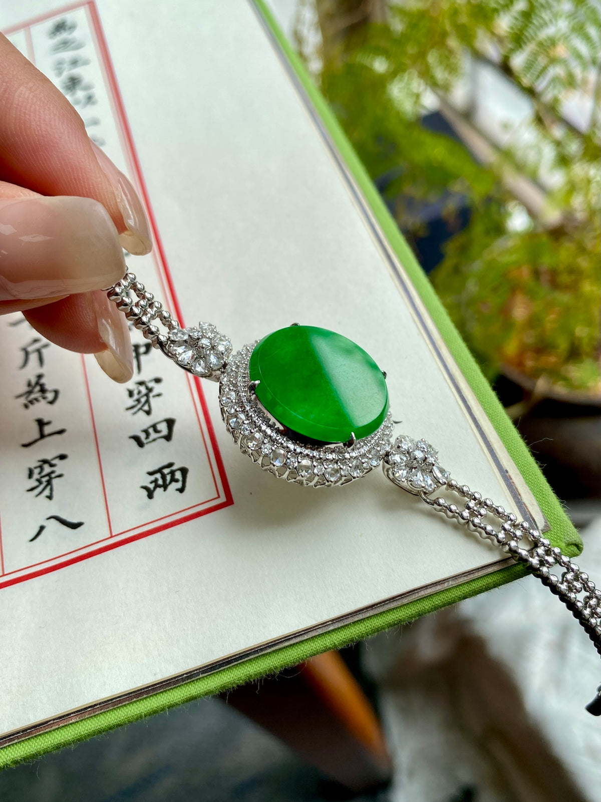 Green jadeite tablet bracelet with silver-tone chain and pavé-style settings