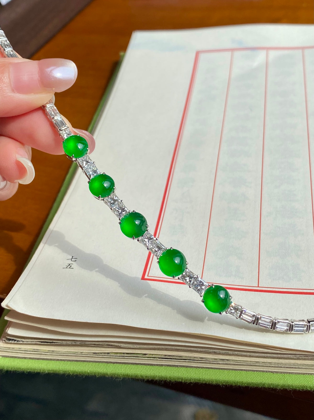 Green jadeite cabochon bracelet with round green stones and silver bar accents