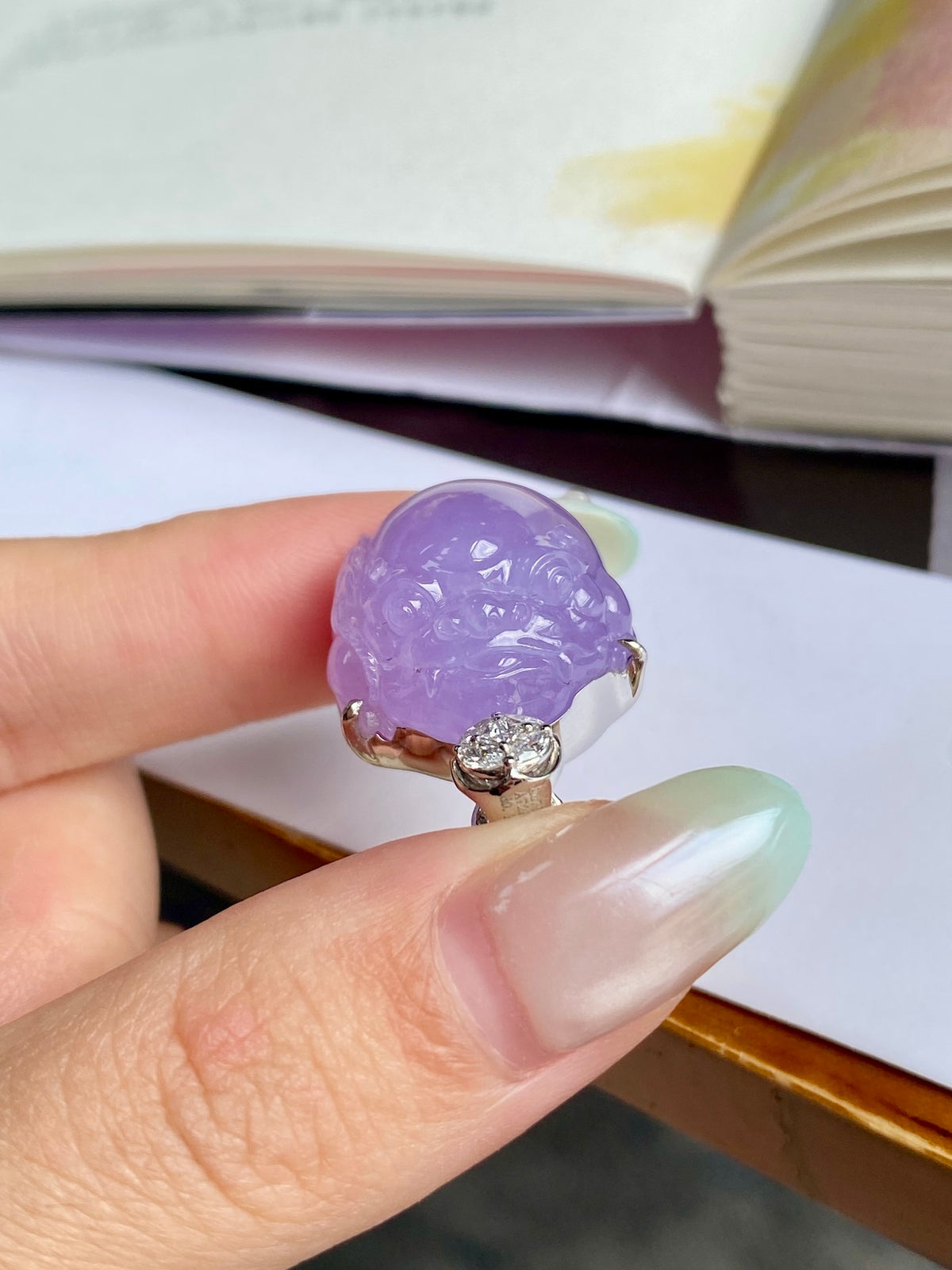 Lavender Pixiu jade pendant with carved face and gold-tone bail, single round crystal