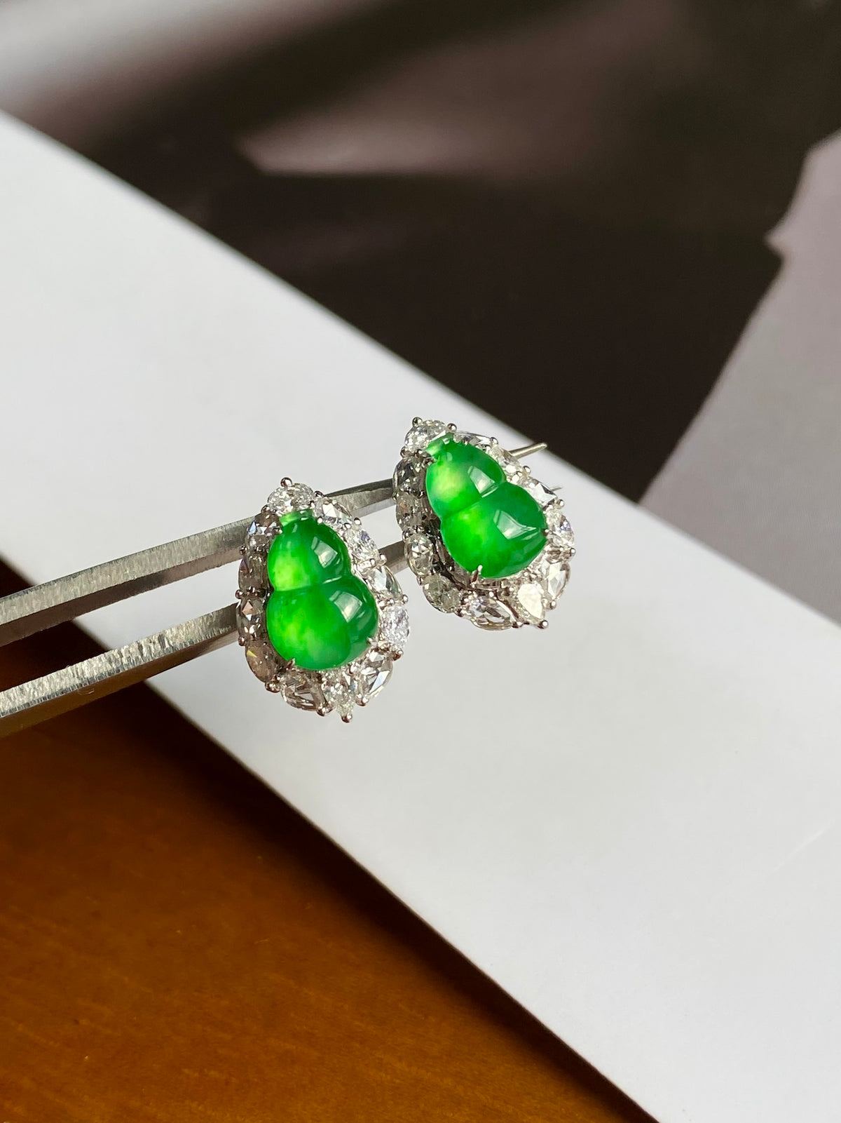 Green jadeite gourd stud earrings with crystal halo, silver-tone posts