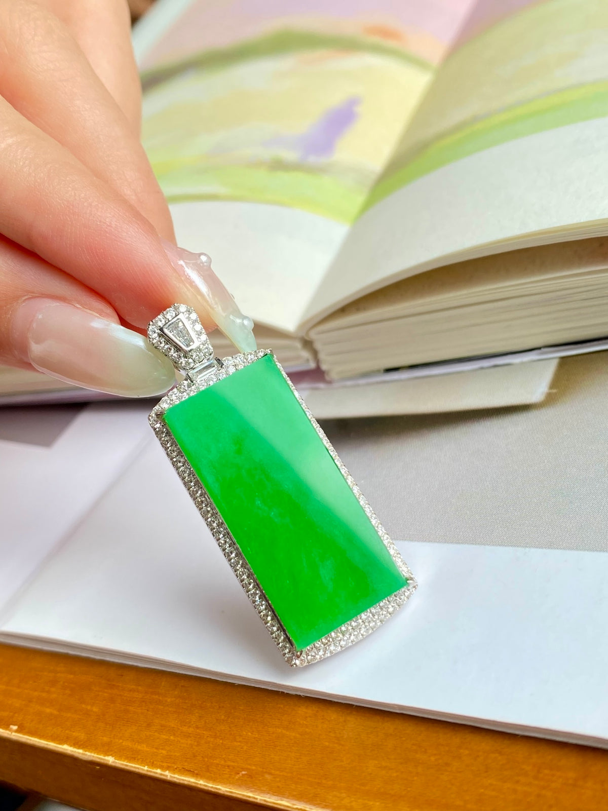 Green jadeite tablet pendant with square top bail in silver and diamond-like bezel