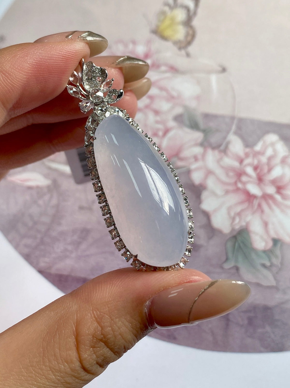 Long oval lavender gemstone pendant with flower cluster top, silver-tone setting