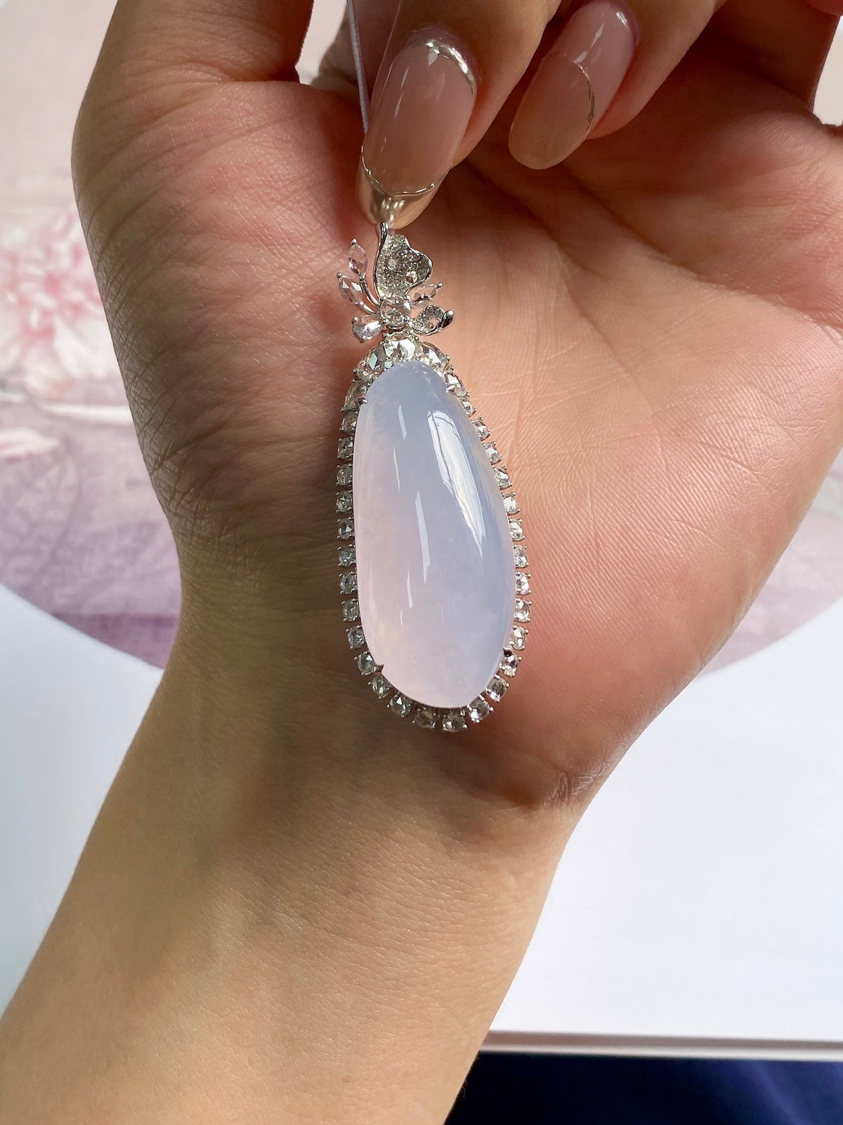 Lavender teardrop gemstone pendant with rhinestone bezel and floral bail, silver