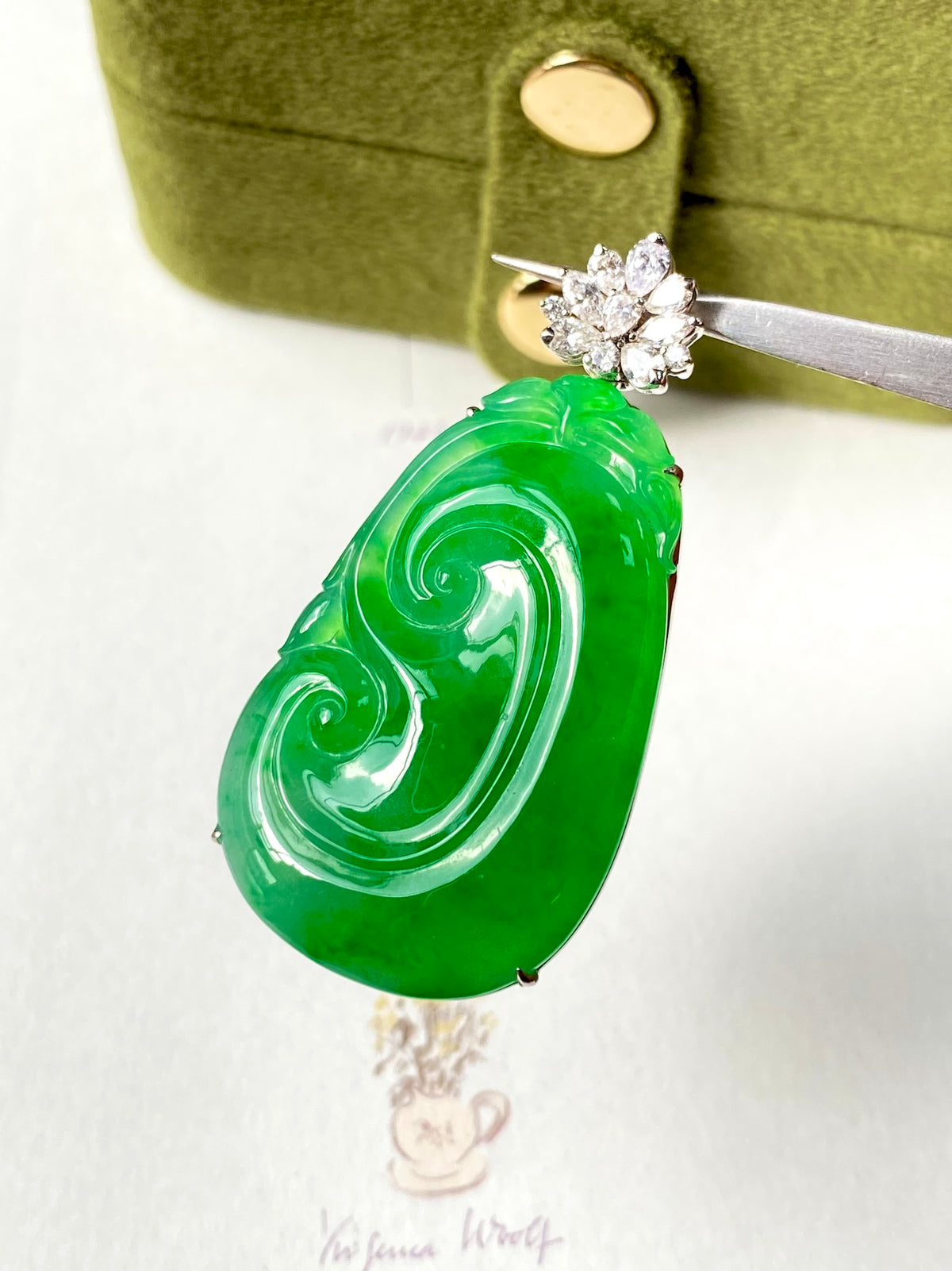 Green jadeite ruyi pendant with flower-like diamond top on silver post