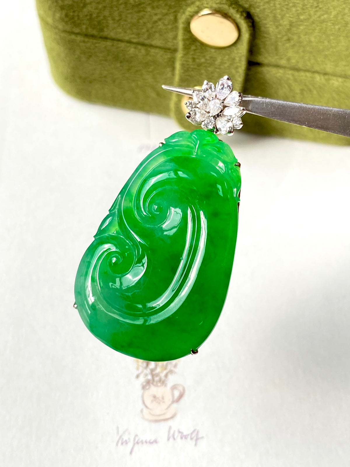 Green jadeite ruyi pendant with diamond cluster top on silver post