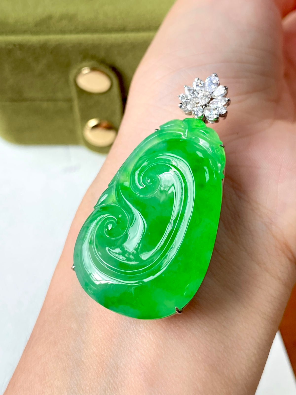 Green jadeite ruyi pendant with diamond cluster top and silver bail
