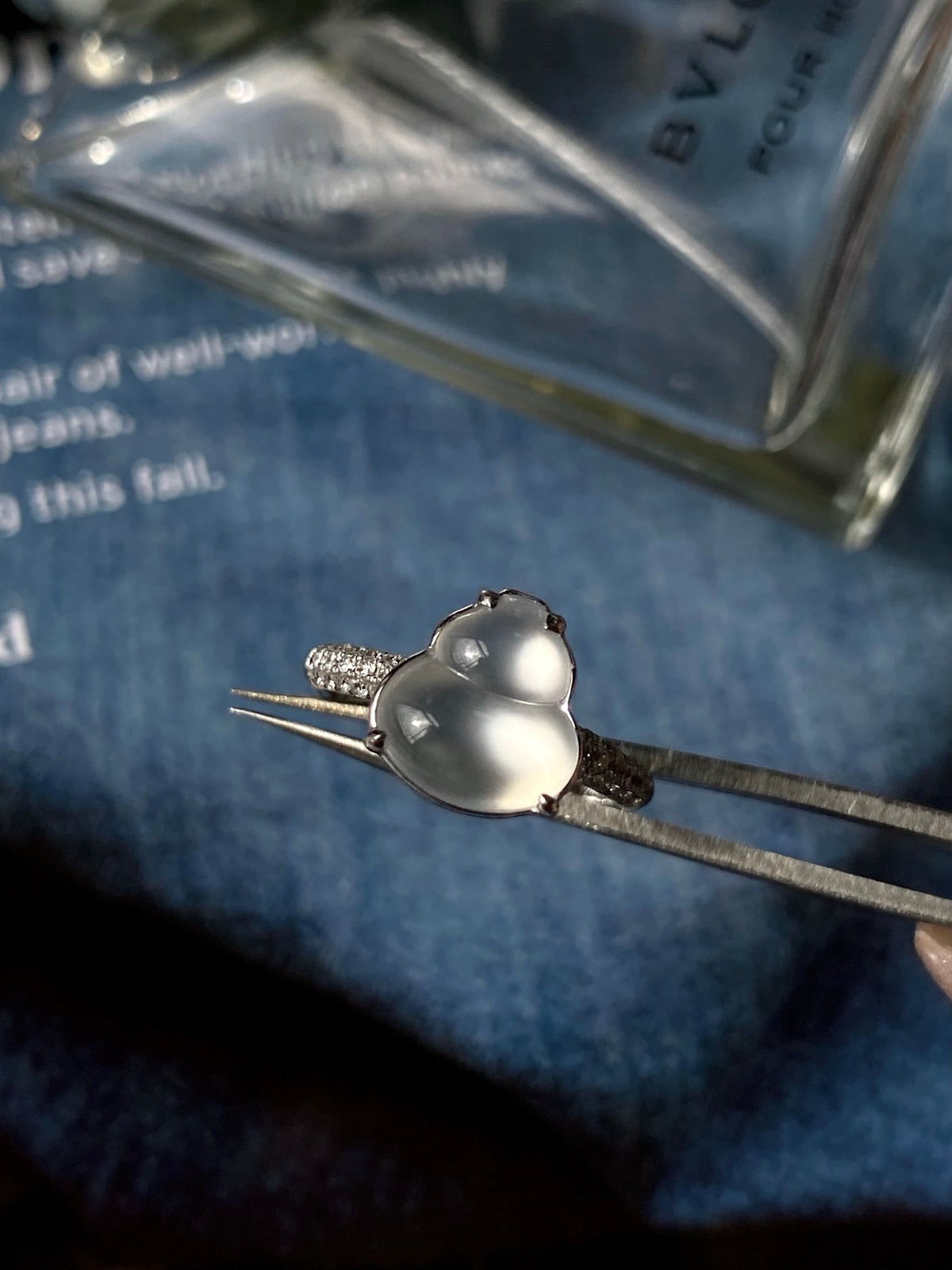 White jadeite gourd ring with smooth double-gourd stone and silver band