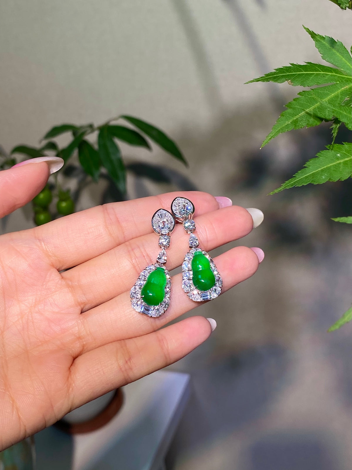 Green jade gourd drop earrings with silver-tone teardrop crystal framing