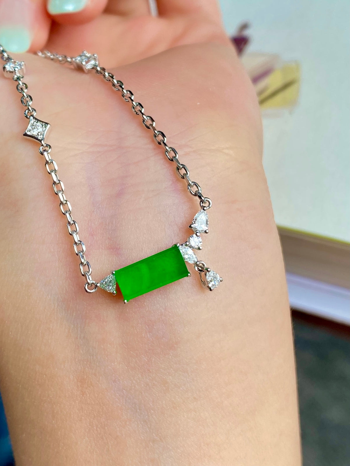 Green jadeite tablet bracelet with silver chain and dangling clear stone charms