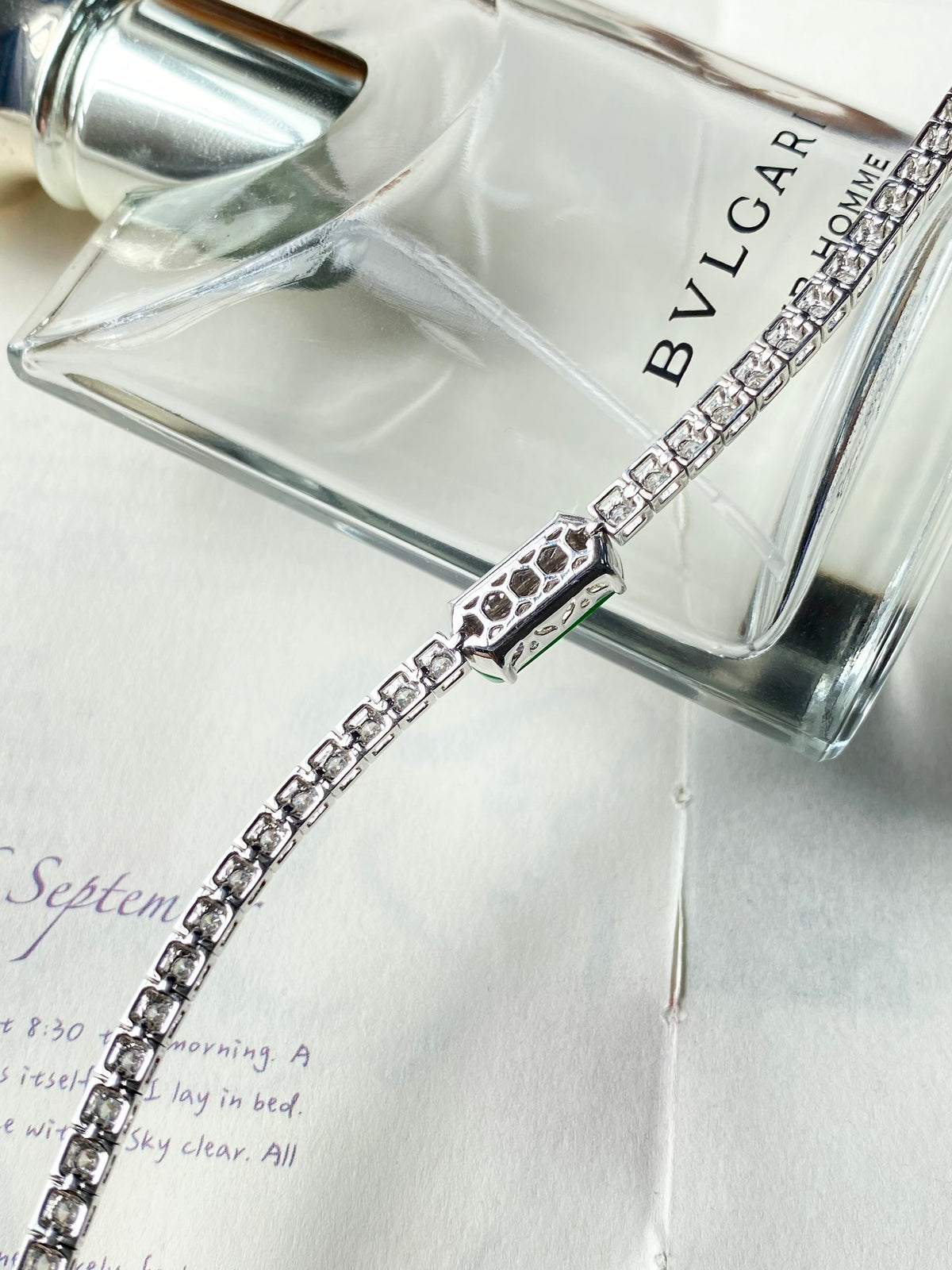 Silver bracelet with green jadeite cabochon and square-link chain