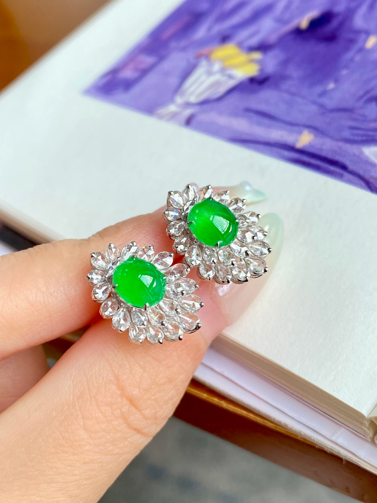 Green jadeite cabochon stud earrings with sparkling silver floral frames