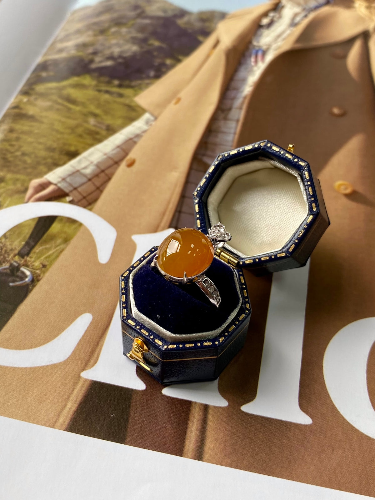 Two-in-one pendant and ring with amber cabochon, clear stone accents, navy box