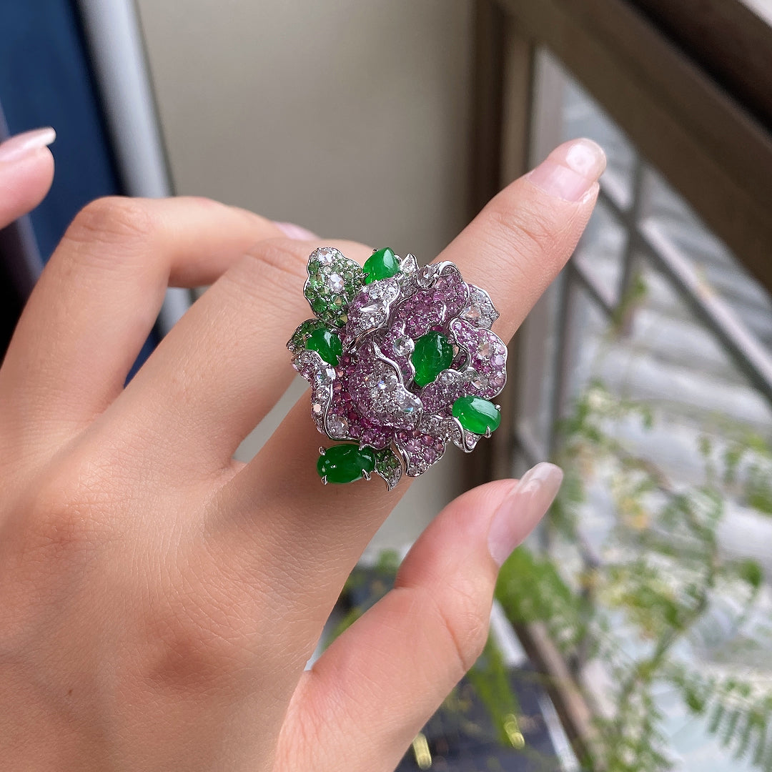 Camellia gemstone ring in silver tone with purple stones and green cabochons, clustered