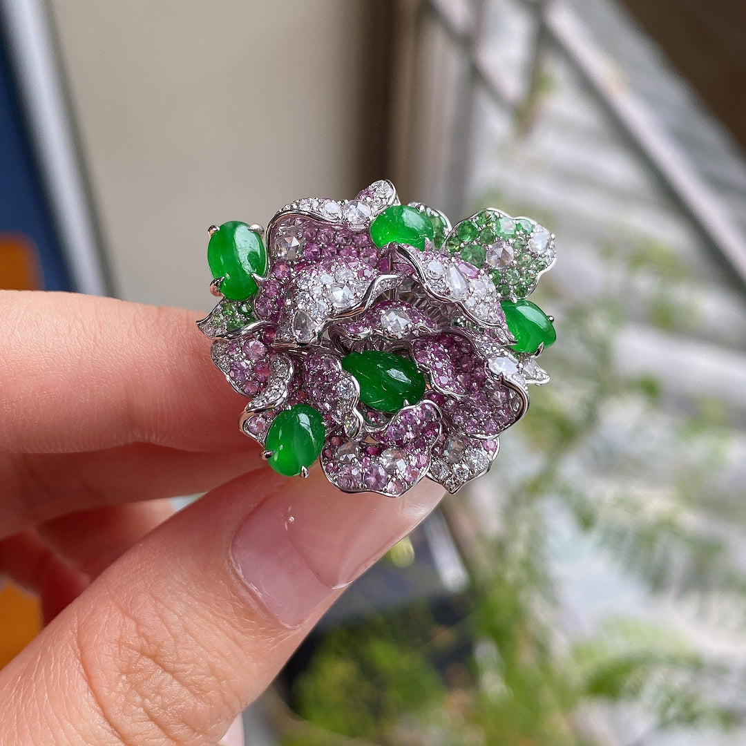 Camellia gemstone ring in silver tone with purple gemstone cluster and green oval accents
