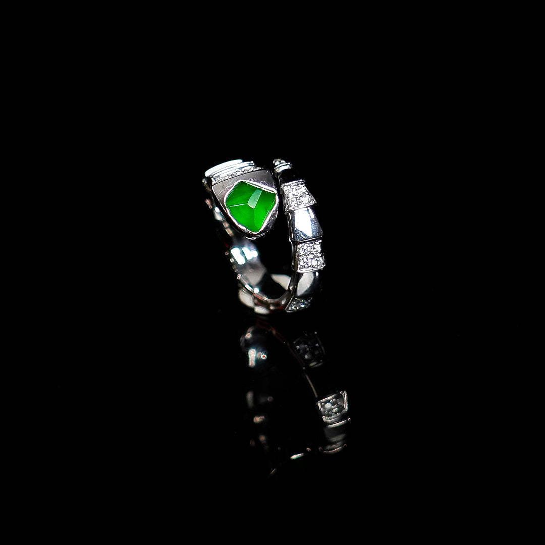 Silver open ring with bright green jadeite cabochon and sparkling crystal side stones