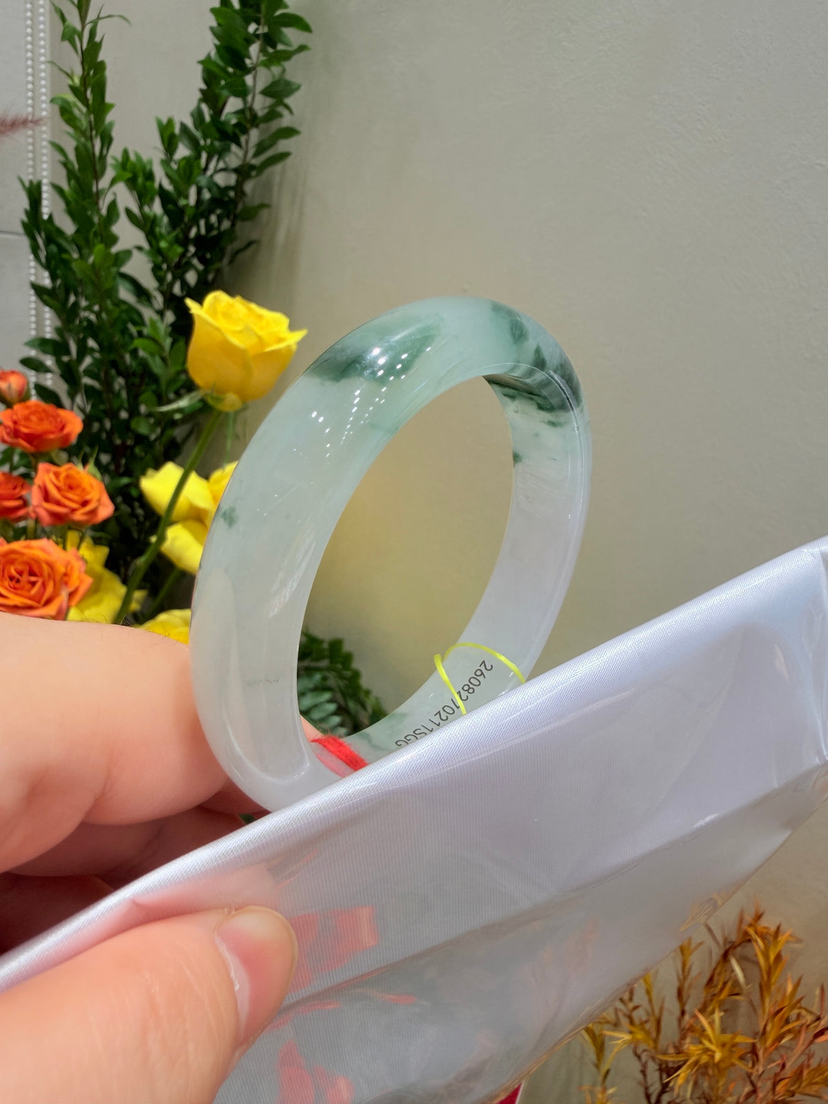 Jadeite bangle, translucent light jade green bracelet with smooth, rounded profile